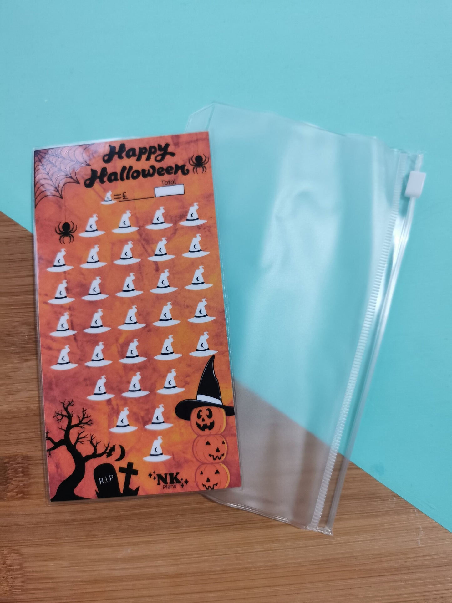 Halloween savings tracker. savings challenge. savings tracker, budgeting. A6 savings challenge.