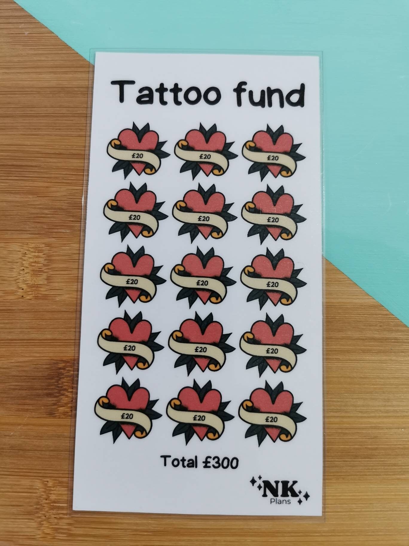 Tattoo fund savings tracker. savings challenge. savings tracker, budgeting. A6 savings challenge.