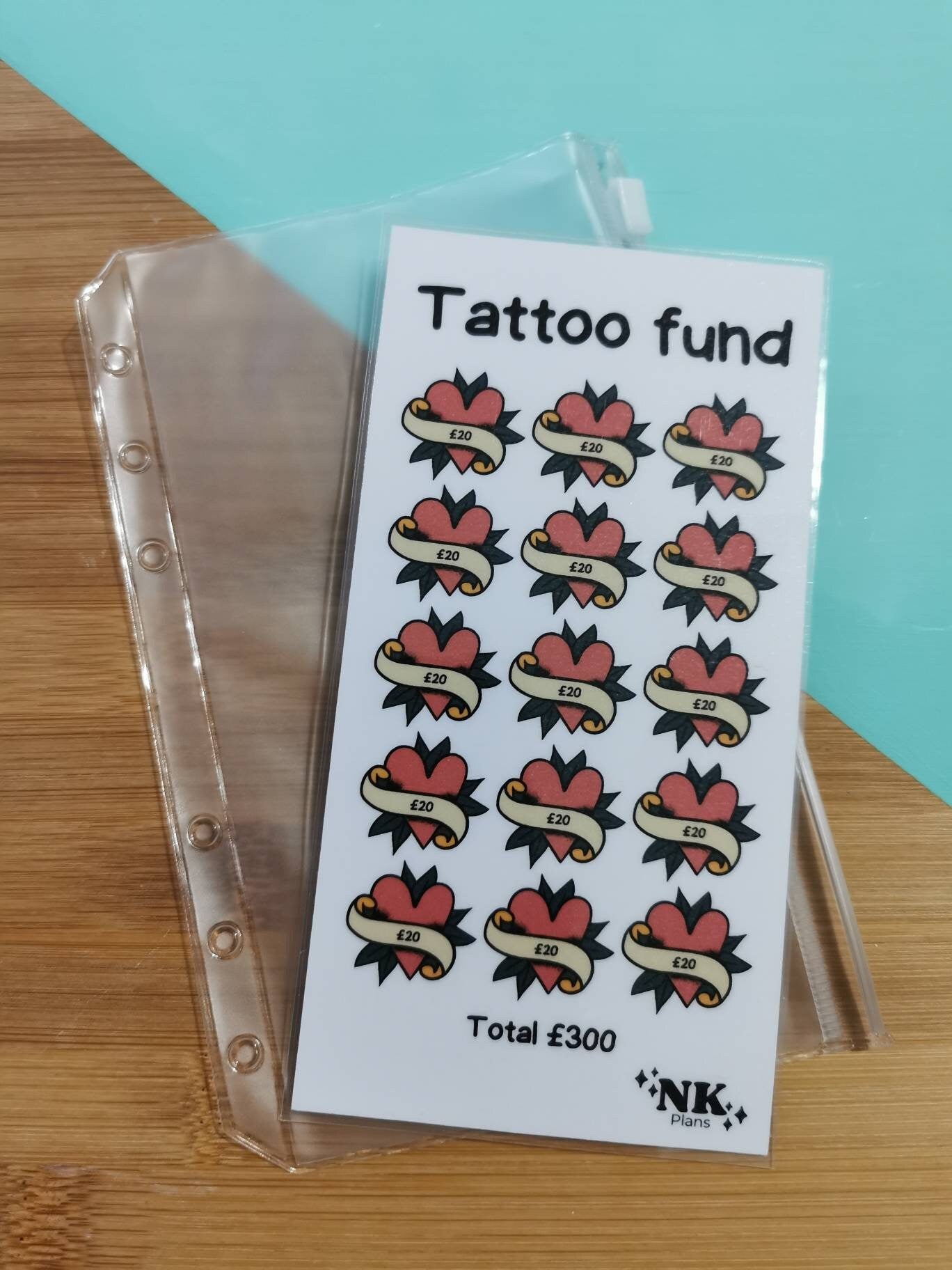 Tattoo fund savings tracker. savings challenge. savings tracker, budgeting. A6 savings challenge.